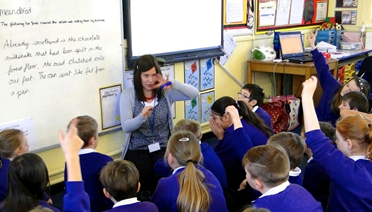 Teacher and class Selby Community Primary