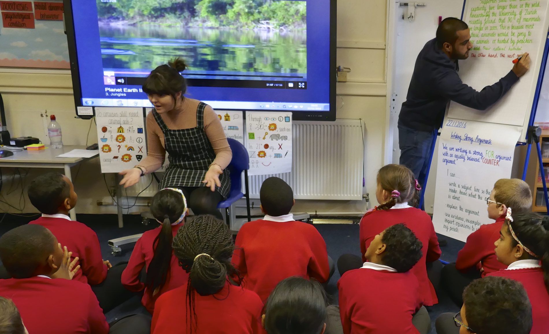 Teacher and flipchart Hallsville Primary School