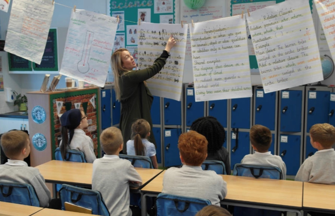 Teacher at flipchart Maidwell Primary School